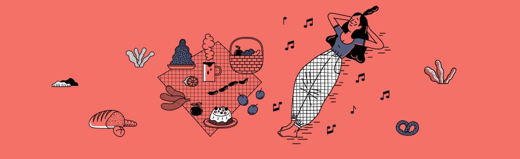 Grafika: dziewczyna leży obok koca piknikowego.