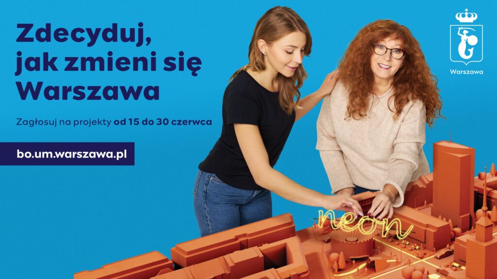 Dwie kobiety nad makietą miasta. Obok napis: " Zdecyduj jak zmieni się Warszawa".